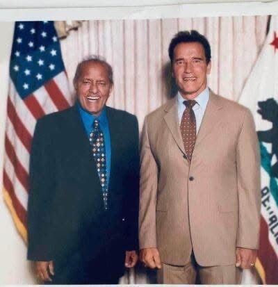 Yogi Ramesh Pandey with Arnold Schwarzenegger