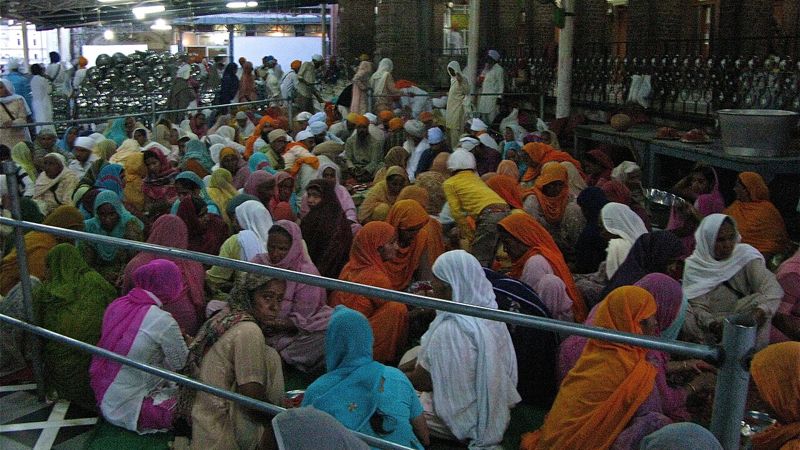 Volunteers preparing ingredients for the Golden Temple langar