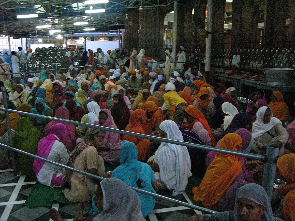 Volunteers preparing ingredients for the free community meal at the Golden Temple langar