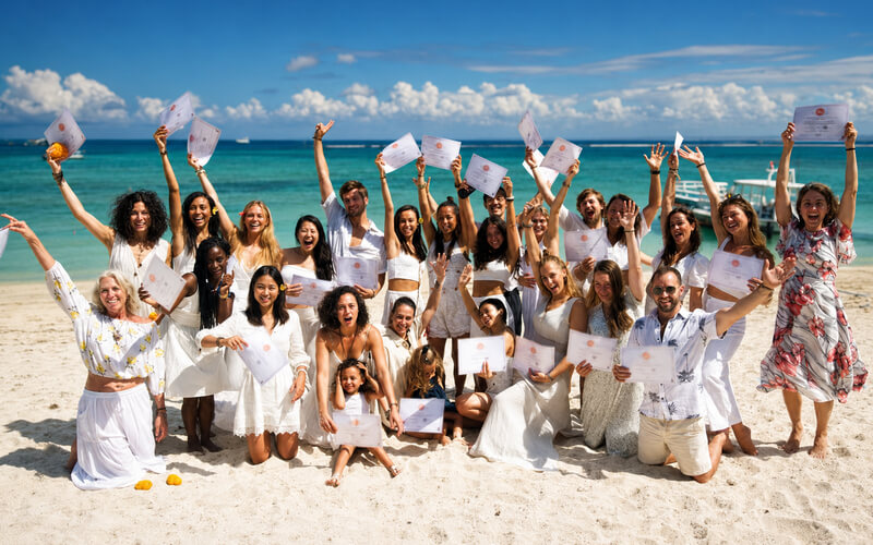 All Yoga Training graduates on the beach in Bali