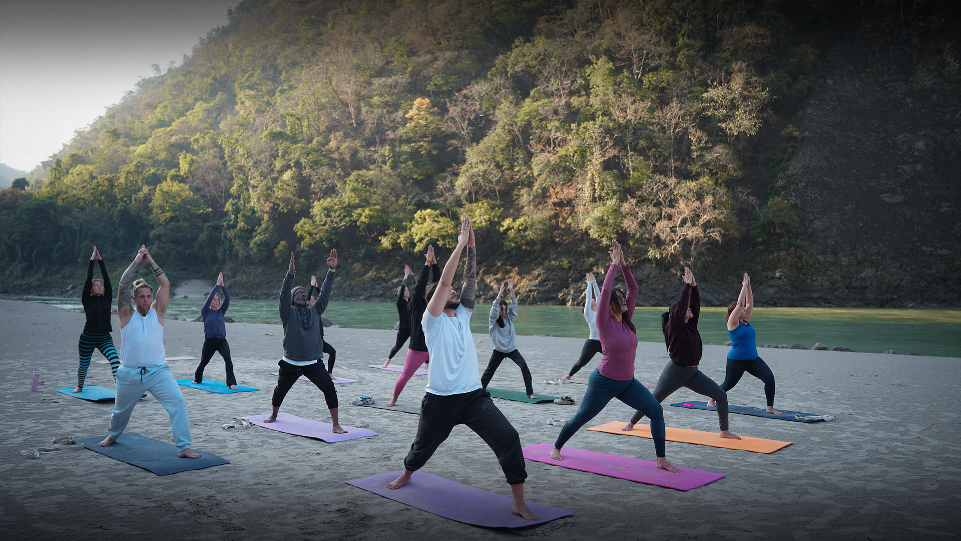 Yoga practice on the beach at Rishikesh Vinyasa Yoga School